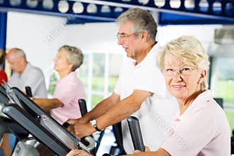 Older people exercising in the gym