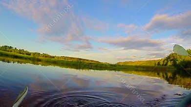 Canoeing on river, paddles entering water, action cam slowmotion