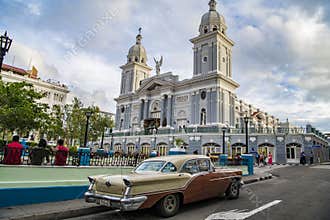 Classic car in front of Cathedral of Santiago de Cuba