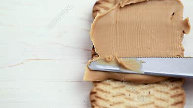 Peanut butter paste with a knife