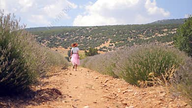 Woman runs in the lavender field