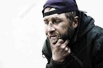 Sad homeless man in depression