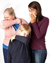 Three people sneezing/coughing