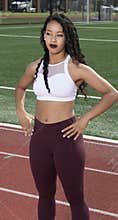 Stunning African-American fitness model on outdoor track