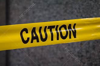Police caution sign tape in city