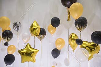Party balloons celebration background golden texture