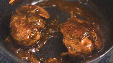 Fried chicken breasts with ginger and chili sauce in a saucepan video