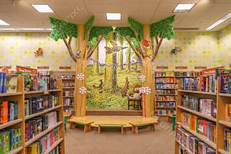 A variety of children`s books are placed on the shelves of the bookstore