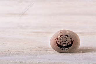 Emoticon with tears of joy