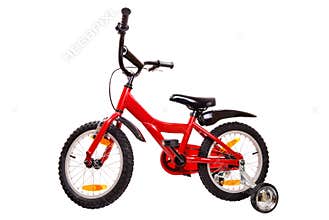 New red children's bicycle on white