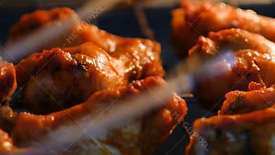 Baking hot and spicy grill chicken wings in the oven with grain processed