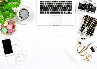Office supplies and laptop Feminine flat lay