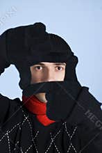 Winter man framing face