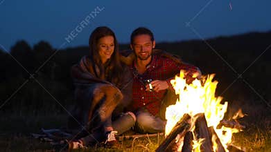 Romantic Weekend. Couple In Love Near Bonfire In Nature