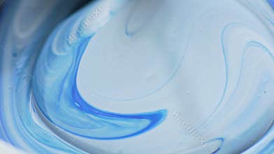 Artist mixing two colors of paints, relaxing and inspiring preparing to work