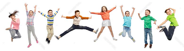 Happy kids jumping in air over white background