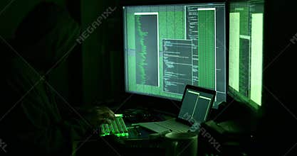 Hacker working with computers