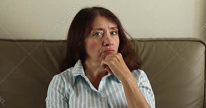 Senior beautiful woman doubting