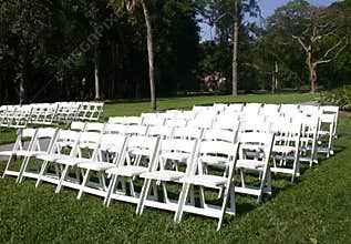 Rows of white chairs