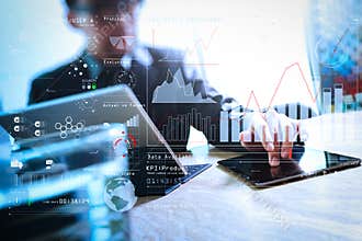 Businessman hand touching digital tablet.Photo finance manager w