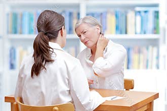Doctor patient neck pain fibromyalgia