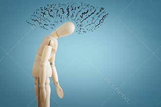 image of wooden dummy with worried stressed thoughts. depression, obsessive compulsive, adhd, anxiety disorders concept.
