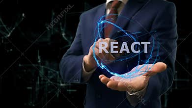 Businessman shows concept hologram React on his hand
