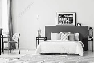 Spacious contrast bedroom interior