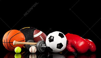 Assorted sports equipment on black