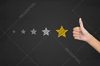 Customer satisfaction survey concept. Thumb up pointing at posit