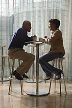 African-American Couple Having Coffee at Cafe
