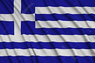 Greece flag is depicted on a sports cloth fabric with many folds. Sport team banner