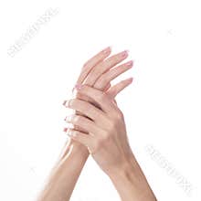 Young woman touching her hand and feeling moisturizing effect of cream on white background