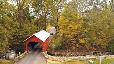 Traffic enters the Roddy road covered bridge