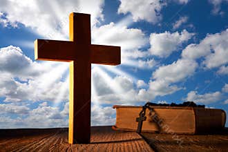 Christian wood cross on blue sky