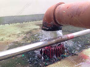 Drainage of cooling tower on the roof of the building.