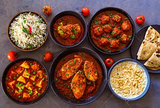 Indian party platter with fish curry and chicken gravy