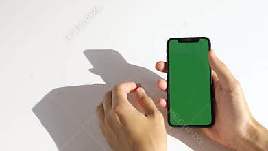 Man Using Phone with Green Screen on the white background