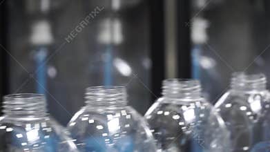 Water factory - Water bottling line for processing and bottling pure spring water into small bottles. Clip. Selective