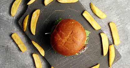 Composition of burger with fries