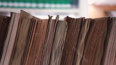 Old books collection on shelf in library