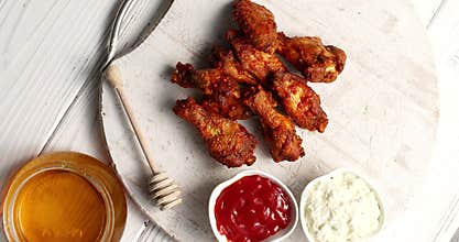 Fried chicken wings on board