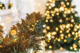 Christmas tree background and Christmas decorations, blurred, sparking, glowing.