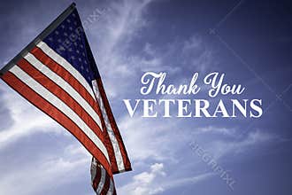 American flags with a Veterans Day greeting