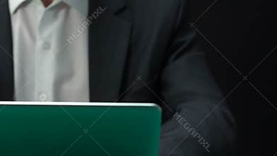 Businessman playing online casino on laptop, spending work time, betting