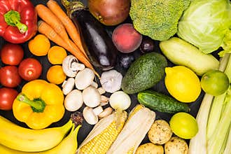 Close-up top view image of fresh organic vegetables and fruit. L