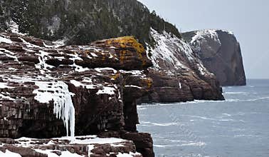 Ice covered ocean cliffs
