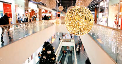 Blurred Christmas shopping center in big black friday sales