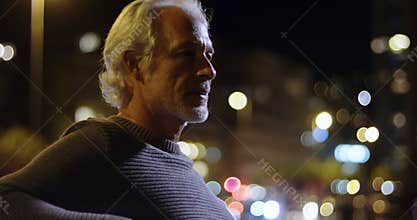 Senior man walking in the city 4k