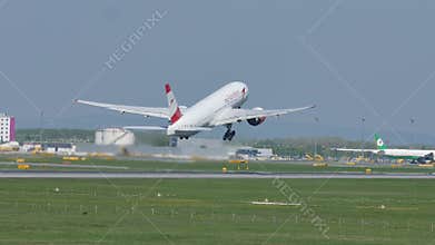 Austrian Airlines jet taking off from Vienna Airport, VIE, on runway